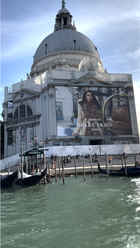 A billboard helps mask the restauration of the Basilica di Santa Maria della Salute