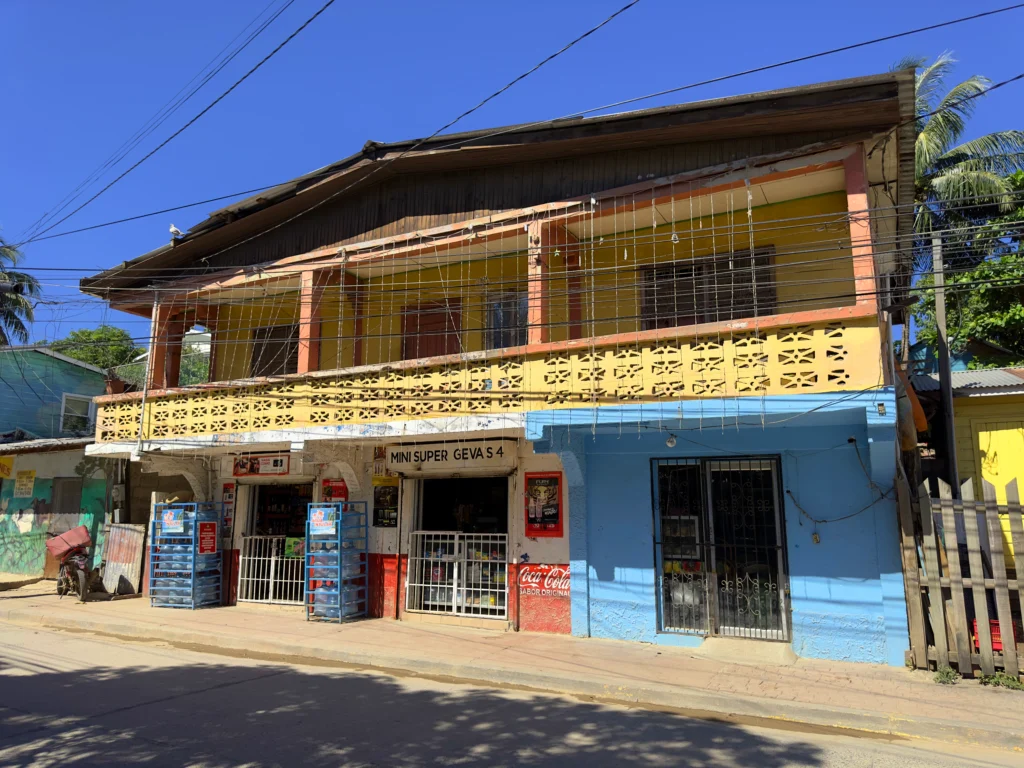 Colourfully painted local supermarket in Coxen Hole