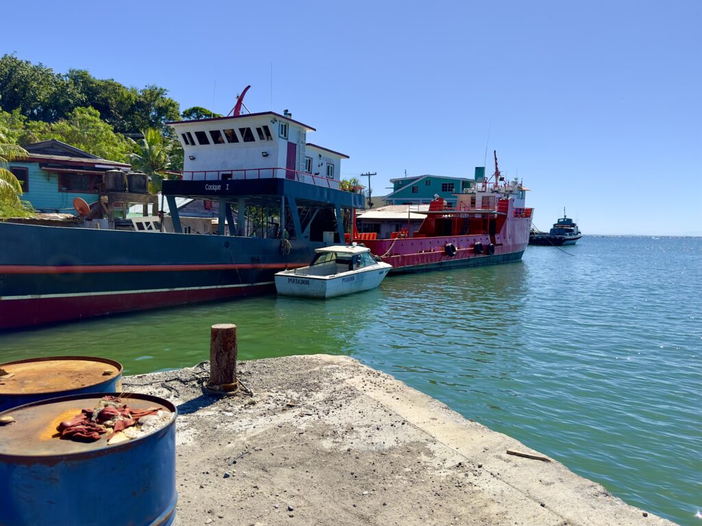 Small cargo vessels docked in Coxen Hole Honduras
