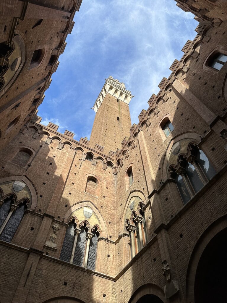 View of the Torre del Mangia from inside the Palazzo Pubblico in Siena.