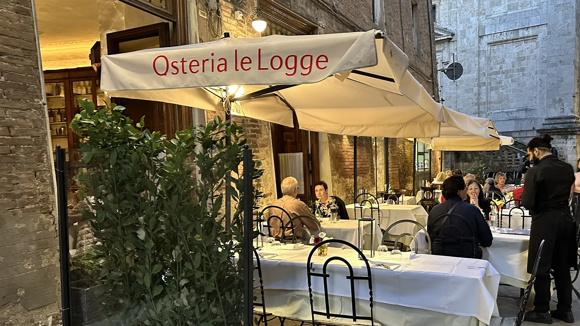 Osteria le Logge features a wonderful outside terrace, perfect for dining on a warm autumn evening.