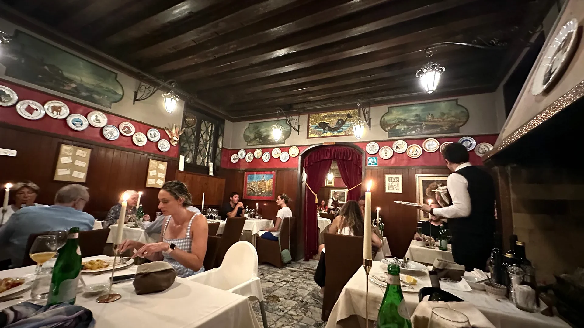 One of the two main dining rooms at Antica Trattoria Poste Vecie.