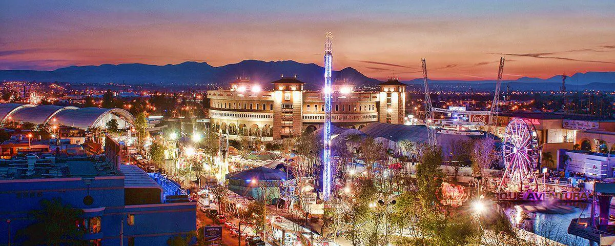 Plaza de Toros and fairgrounds at sunset during Feria San Marcos in Aguascalientes Mexico