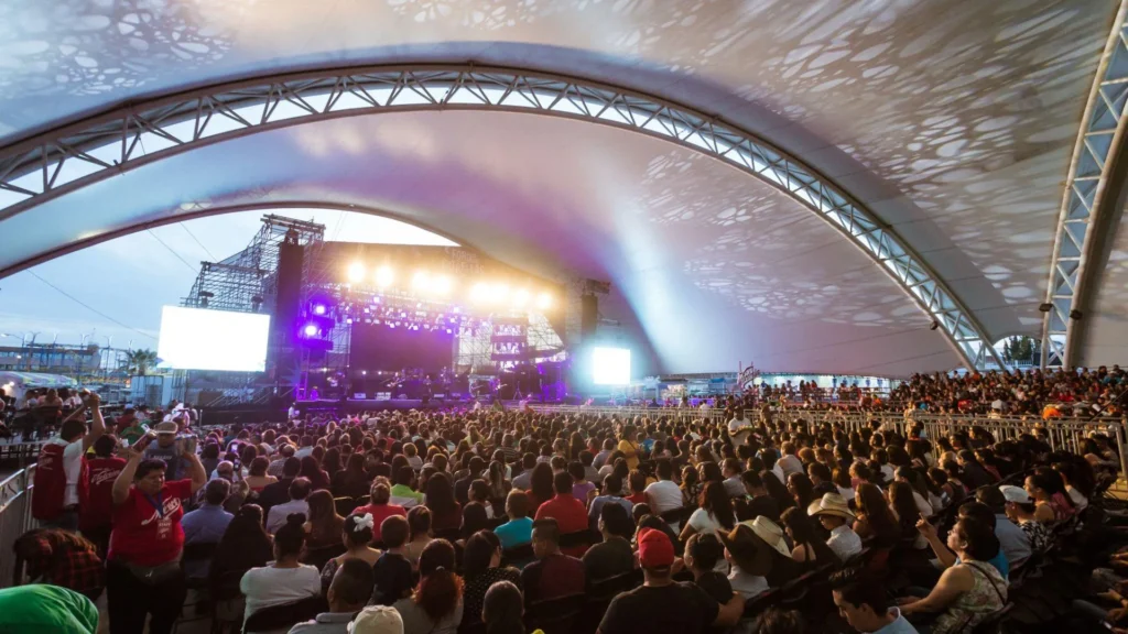 Crowd watching a live concert at Foro de las Estrellas during Feria San Marcos in Aguascalientes Mexico